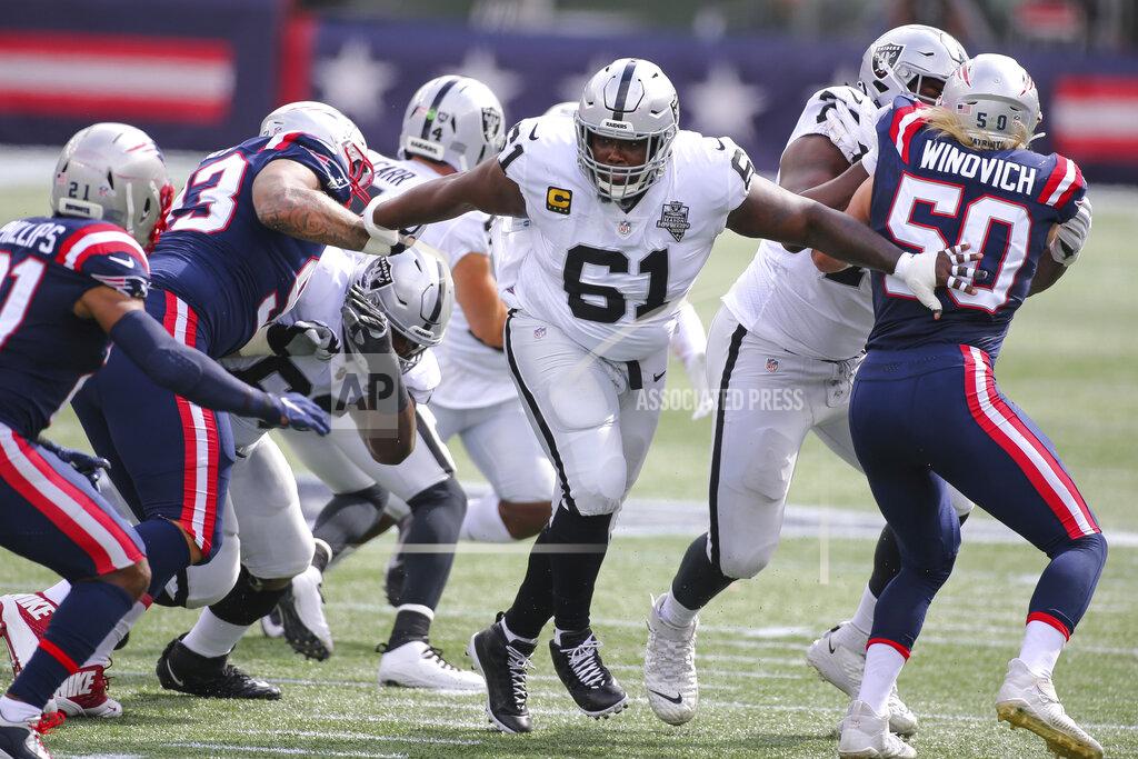 Stew Milne FILE - In this Sunday, Sept. 27, 2020 file photo, Las Vegas Raiders center Rodney Hudson (61) during the first half of an NFL football game against the New England Patriots in Foxborough, Mass. The Arizona Cardinals made a pair of big offseason moves, adding seven-time Pro Bowl receiver A.J. Green on a one-year deal and trading for three-time Pro Bowl center Rodney Hudson. (AP Photo/Stew Milne, File)