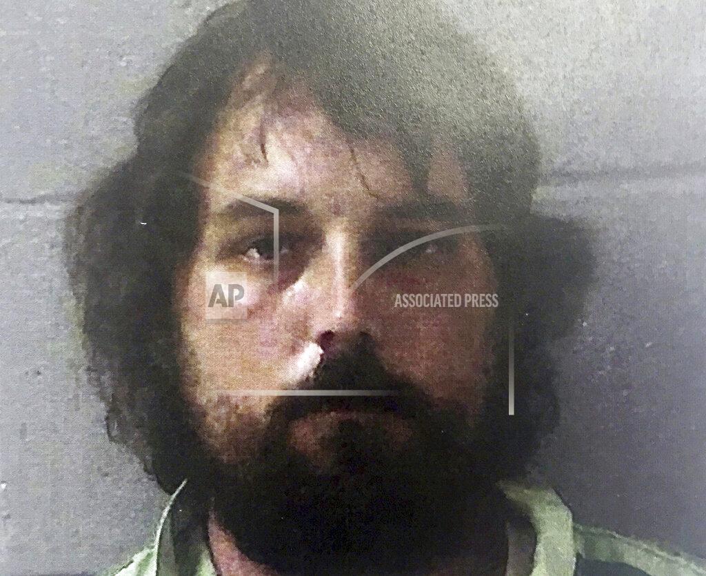 Uncredited FILE - This Feb. 22, 2017, file photo provided by the Georgia Bureau of Investigation shows Ryan Duke. Georgia's highest court opened a door Monday, March 15, 2021, for taxpayer funds to help cover the legal defense of Duke, who is awaiting trial for the 2005 slaying of a high school teacher whose disappearance remained a mystery for more than a decade. (Georgia Bureau of Investigation via AP, File)