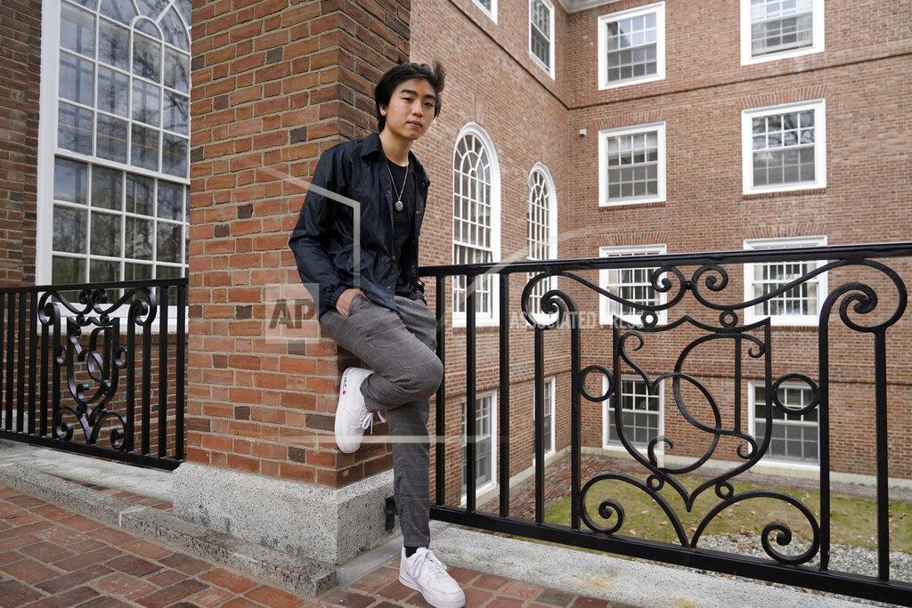 Steven Senne Nicholas Sugiarto, of San Diego, Calif., a student at Dartmouth College, stands for a photograph on the school's campus, Tuesday, April 20, 2021, in Hanover, N.H. A wave of anti-Asian attacks that started more than a year ago with the pandemic, along with the March 2021 shootings in Atlanta that left six Asian women dead, have provoked national conversations about the visibility of Asian Americans. (AP Photo/Steven Senne)