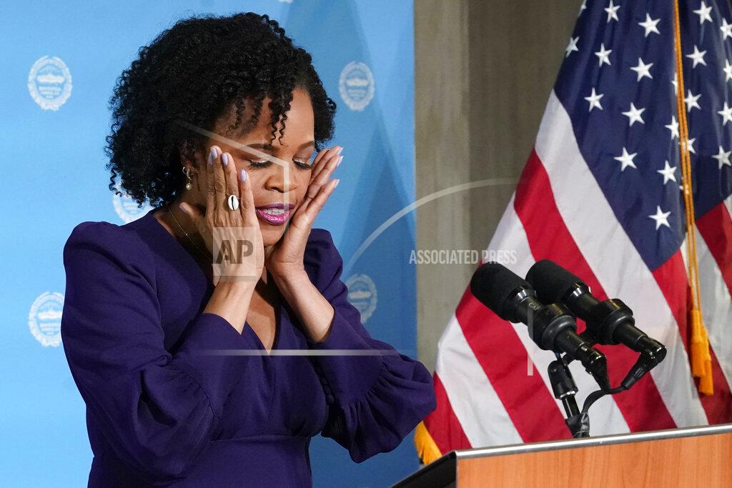 Elise Amendola Former Boston City Council President Kim Janey, 55, composes herself as she begins to speak after being sworn in as Boston's new mayor at City Hall, Wednesday, March 24, 2021, in Boston. Janey, who is the city's first female and first person of color to take the office, replaces Marty Walsh who resigned Monday evening to become President Joe Biden's labor secretary. (AP Photo/Elise Amendola)