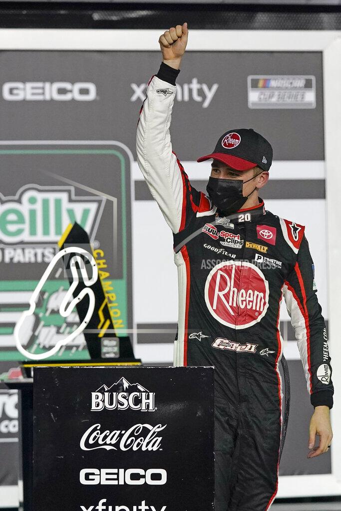 John Raoux Christopher Bell celebrates in Victory Lane after winning the NASCAR Cup Series road course auto race at Daytona International Speedway, Sunday, Feb. 21, 2021, in Daytona Beach, Fla. (AP Photo/John Raoux)