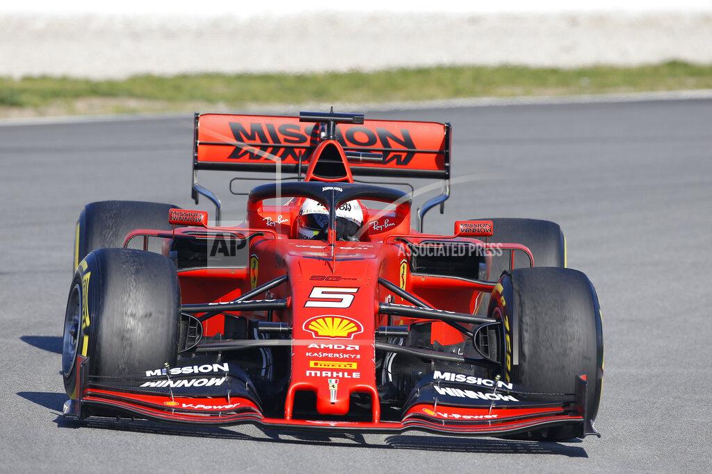 Joan Monfort Ferrari driver Sebastian Vettel of Germany steers his car during a Formula One pre-season testing session at the Barcelona Catalunya racetrack in Montmelo, outside Barcelona, Spain, Wednesday, Feb. 27, 2019. (AP Photo/Joan Monfort)