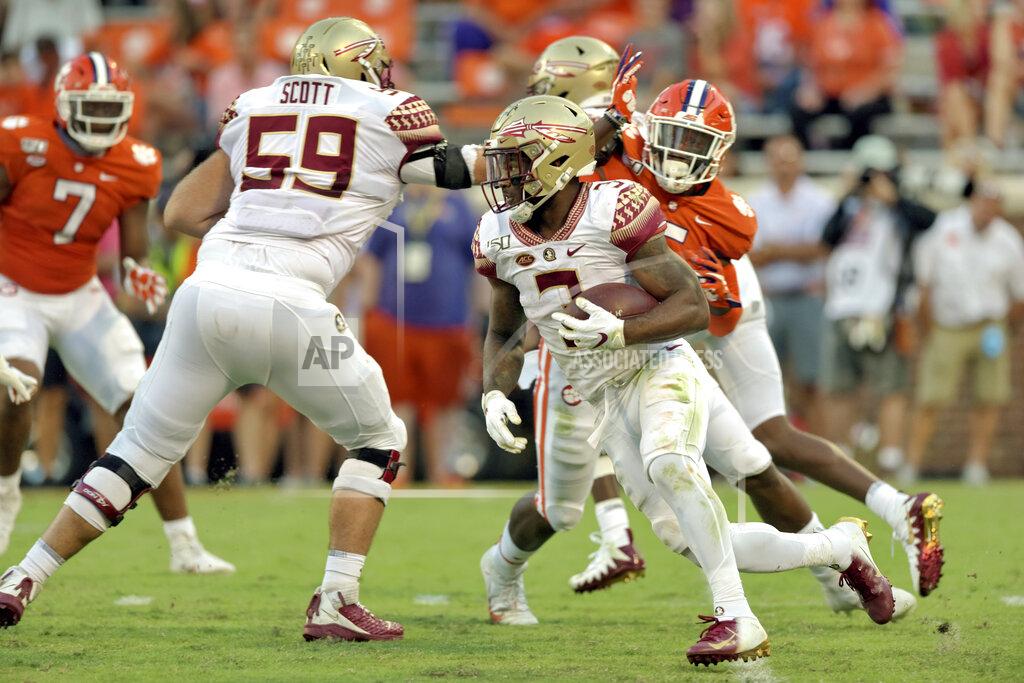 Richard Shiro Florida State's Cam Akers (3) rushes out of the backfield for a first down during the second half of an NCAA college football game against Clemson Saturday, Oct. 12, 2019, in Clemson, S.C. (AP Photo/Richard Shiro)