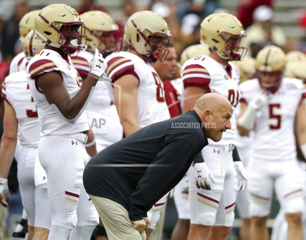 Richard W. Rodriguez Boston College head coach Steve Addazio watches warm ups before the First Responder Bowl NCAA football game against Boise State Wednesday, Dec. 26, 2018, in Dallas. (AP Photo/Richard W. Rodriguez)