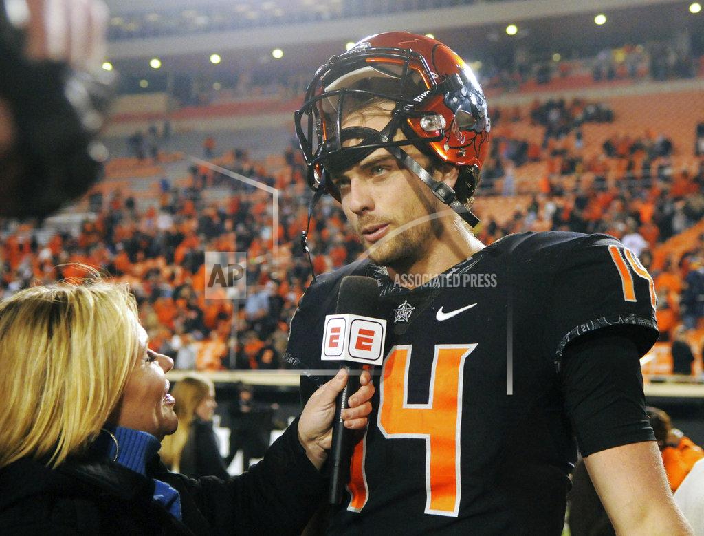 Brody Schmidt Oklahoma State quarterback Taylor Cornelius speaks with a reporter following an NCAA college football game in Stillwater, Okla., Saturday, Nov. 17, 2018. Oklahoma State defeated West Virginia 45-41. (AP Photo/Brody Schmidt)