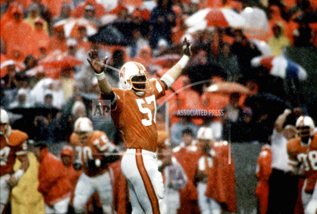 Uncredited This Dec. 16, 1979, photo shows Tampa Bay Buccaneers linebacker David Lewis celebrating Tampa Bay's 3-0 win over the Kansas City Chiefs, in Tampa, Fla. Lewis, a key member of the Tampa Bay Buccaneers’ 1979 team that reached the NFC title game, has died. He was 65. Lewis died Tuesday, July 14, 2020, in Tampa. The cause was not immediately known, but he had struggled with health issues in recent years, according to Southern California, where he played in college. (Tampa Bay Times via AP)