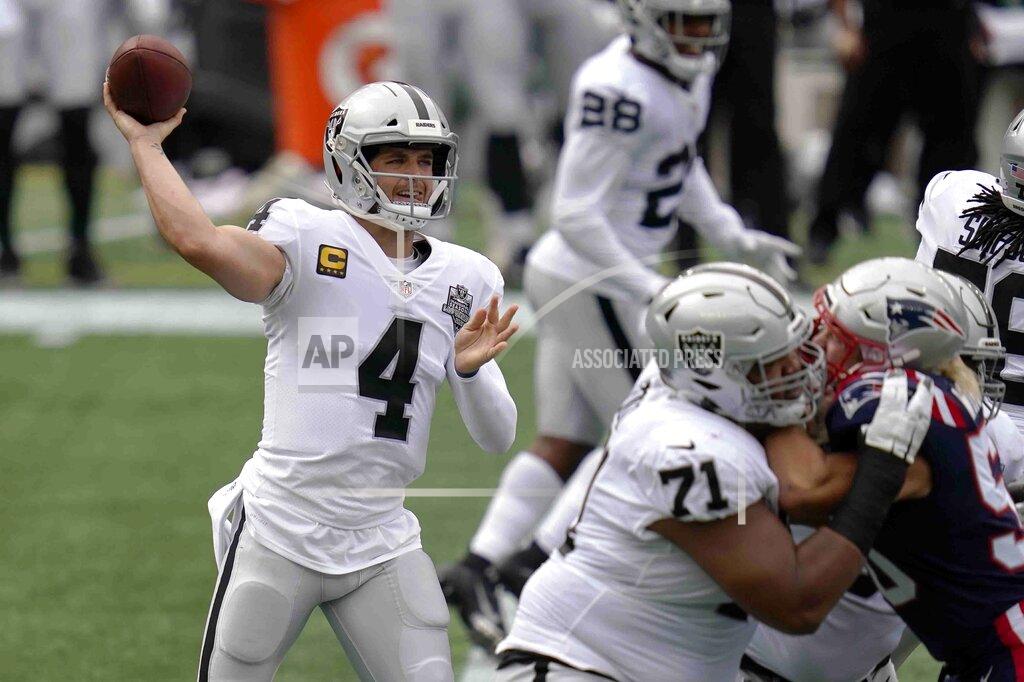 Charles Krupa Las Vegas Raiders quarterback Derek Carr (4) passes against the New England Patriots in the first half of an NFL football game, Sunday, Sept. 27, 2020, in Foxborough, Mass. (AP Photo/Charles Krupa)