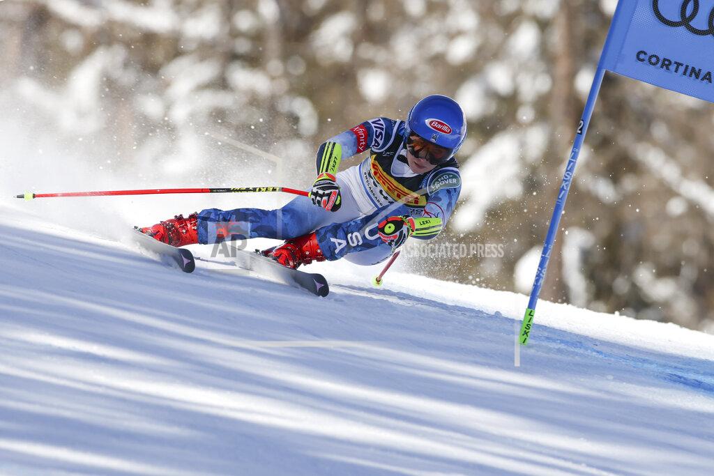 United States' Mikaela Shiffrin speeds down the course during the women's super-G, at the alpine ski World Championships, in Cortina d'Ampezzo, Italy, Thursday, Feb. 11, 2021. (AP Photo/Marco Trovati)