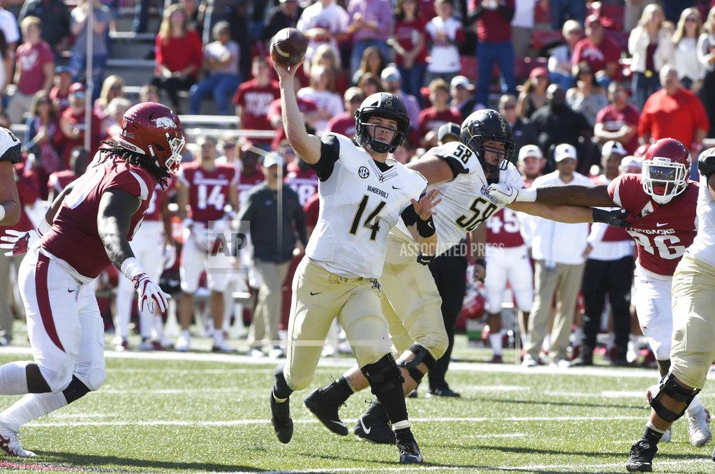 Michael Woods Vanderbilt quarterback Kyle Shurmur throws a pass against Arkansas in the second half of an NCAA college football game Saturday, Oct. 27, 2018, in Fayetteville, Ark. (AP Photo/Michael Woods)