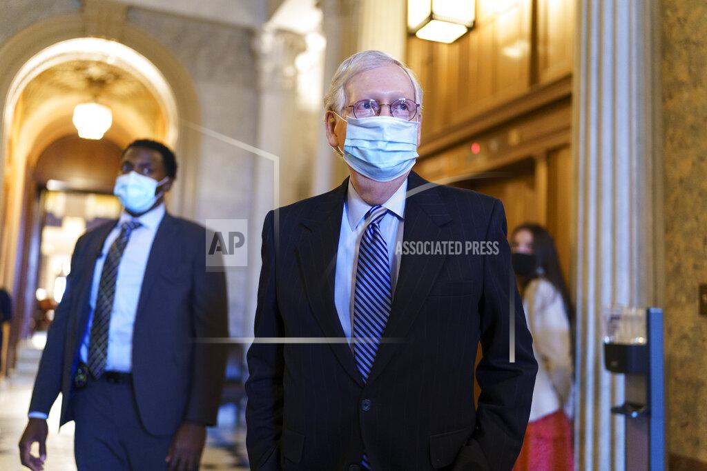 Senate Minority Leader Mitch McConnell, R-Ky., leaves the chamber after criticizing Democrats for wanting to change the filibuster rule, at the Capitol in Washington, Tuesday, March 16, 2021. (AP Photo/J. Scott Applewhite)