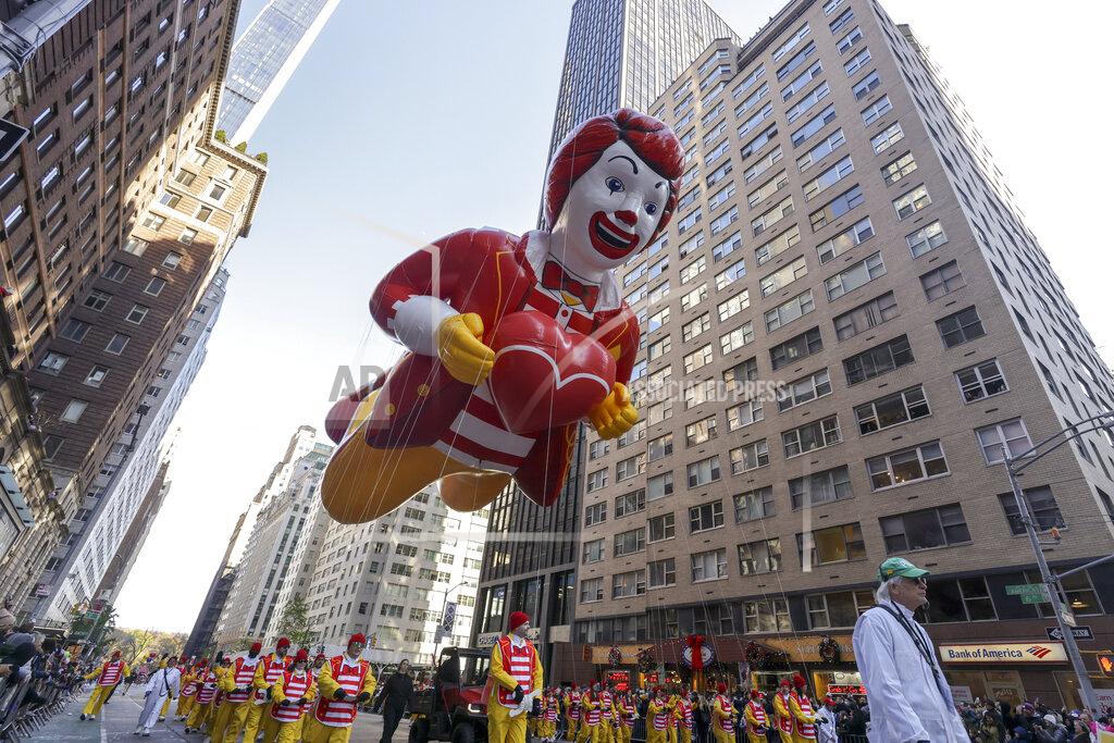 Jeenah Moon Handlers steer the Ronald McDonald balloon down Sixth Avenue during the Macy's Thanksgiving Day Parade, Thursday, Nov. 24, 2022, in New York. (AP Photo/Jeenah Moon)