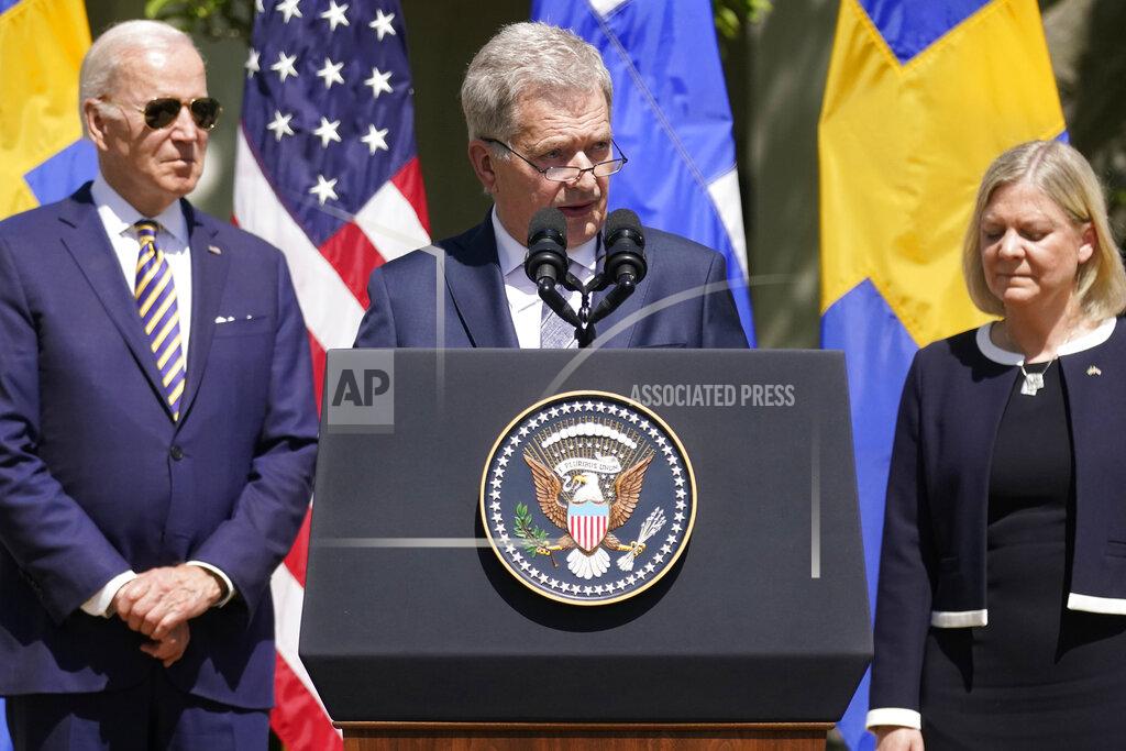 Andrew Harnik Finnish President Sauli Niinisto speaks, with President Joe Biden and Swedish Prime Minister Magdalena Andersson, in the Rose Garden of the White House in Washington, Thursday, May 19, 2022. (AP Photo/Andrew Harnik)