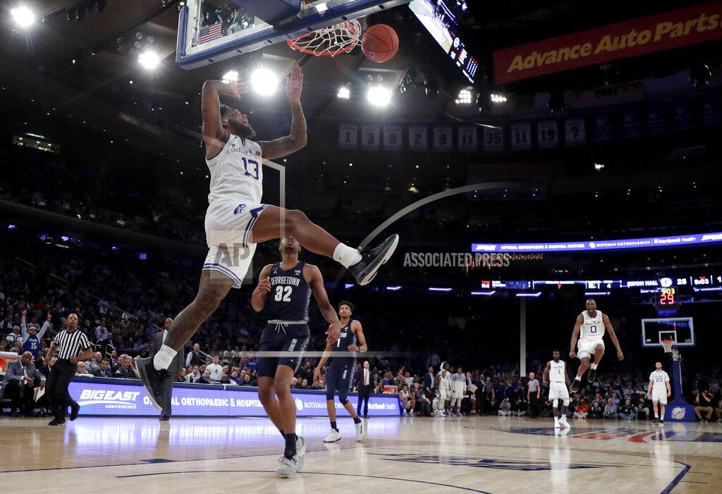 Julio Cortez Seton Hall guard Myles Powell scores a basket on Georgetown during the first half of an NCAA college basketball game in the Big East men's tournament, Thursday, March 14, 2019, in New York. (AP Photo/Julio Cortez)