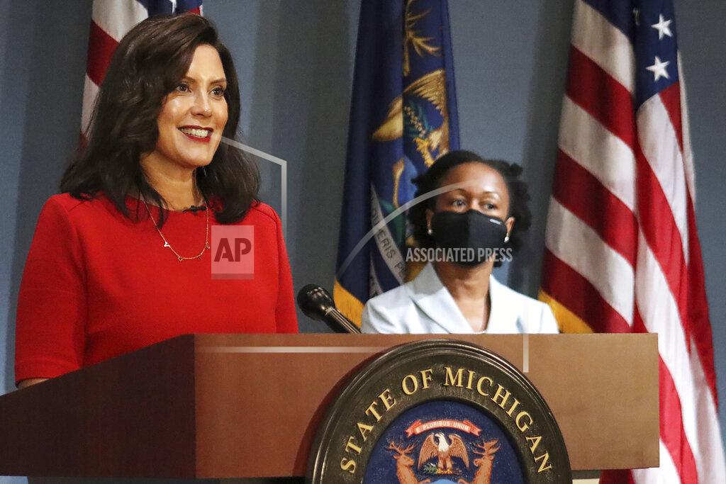 Uncredited FILE - In this photo Sept. 16, 2020 file photo, provided by the Michigan Office of the Governor, Gov. Whitmer addresses the state during a speech in Lansing, Mich. According to a criminal complaint unsealed Thursday, Oct. 8 multiple people plotted to try to kidnap Whitmer at her vacation home. (Michigan Office of the Governor via AP, File)