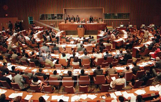 FILE - In this Tuesday, Sept. 10, 1996, file photo, the United Nations General Assembly meets for discussions on the Nuclear Test Ban Treaty at U.N. headquarters. The year 2021 marks the 25th anniversary of the signing of the Comprehensive Nuclear Test Ban Treaty, which has yet to enter into force for lack of ratification by eight crucial nations but has helped reduce such tests. And it's the 75th anniversary of the General Assembly's very first resolution, which sought proposals to eliminate atomic weapons. (AP Photo/Osamu Honda, File)
