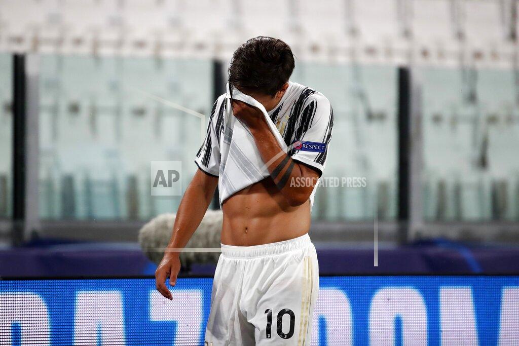 Antonio Calanni Juventus' Paulo Dybala reacts as he lives the pitch during the Champions League round of 16 second leg, soccer match between Juventus and Lyon at the Allianz stadium in Turin, Italy, Friday, Aug. 7, 2020. (AP Photo/Antonio Calanni)