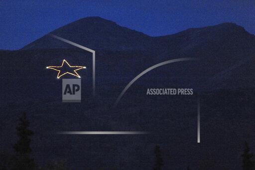 The Joint Base Elmendorf-Richardson star is Illuminated on the side of Mount Gordon Lyon on Wednesday, Sept. 11, 2019, just east of Anchorage, Alaska, in observation of the 18th anniversary of the terrorist attacks. A crew from the base went to light the 300-foot (91-meter) wide holiday star, but found that only half of the star’s 350 or so lights were working, the Anchorage Daily News reported. Airmen from the 773rd Civil Engineer Squadron Electrical Shop haven't been able to figure out what was wrong and repair the lights, but they plan to work through the week, if necessary, base spokesperson Erin Eaton said. (Bill Roth/Anchorage Daily News via AP)