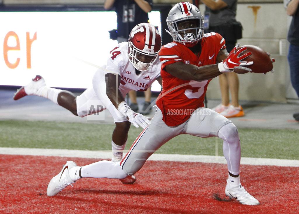 Jay Laprete FILE - In this Oct. 6, 2018, file photo, Ohio State receiver Binjimen Victor, right, catches a touchdown in front of Indiana defensive back Andre Brown during the second half of an NCAA college football game in Columbus, Ohio. Victor, a junior, is coach Urban Meyer’s pick for most improved Buckeye.
(AP Photo/Jay LaPrete, File)