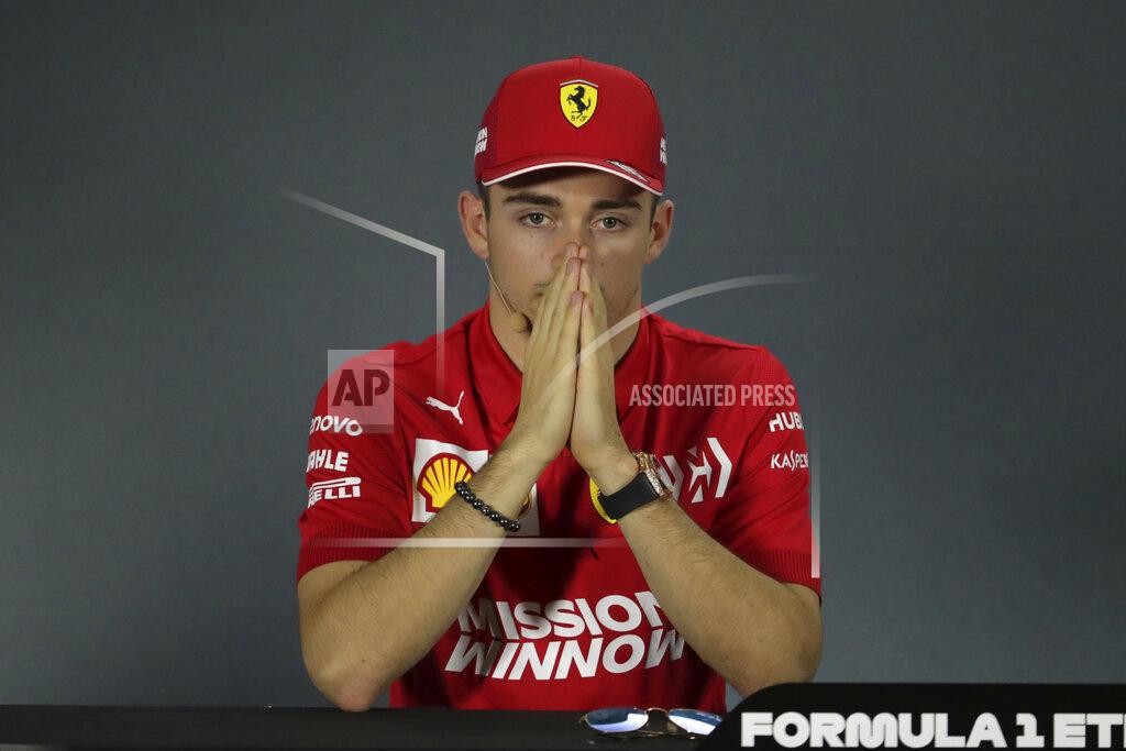 Hassan Ammar Ferrari driver Charles Leclerc of Monaco attends a news conference at the Yas Marina racetrack in Abu Dhabi, United Arab Emirates, Thursday, Nov. 28, 2019. The Emirates Formula One Grand Prix will take place on Sunday. (AP Photo/Hassan Ammar)