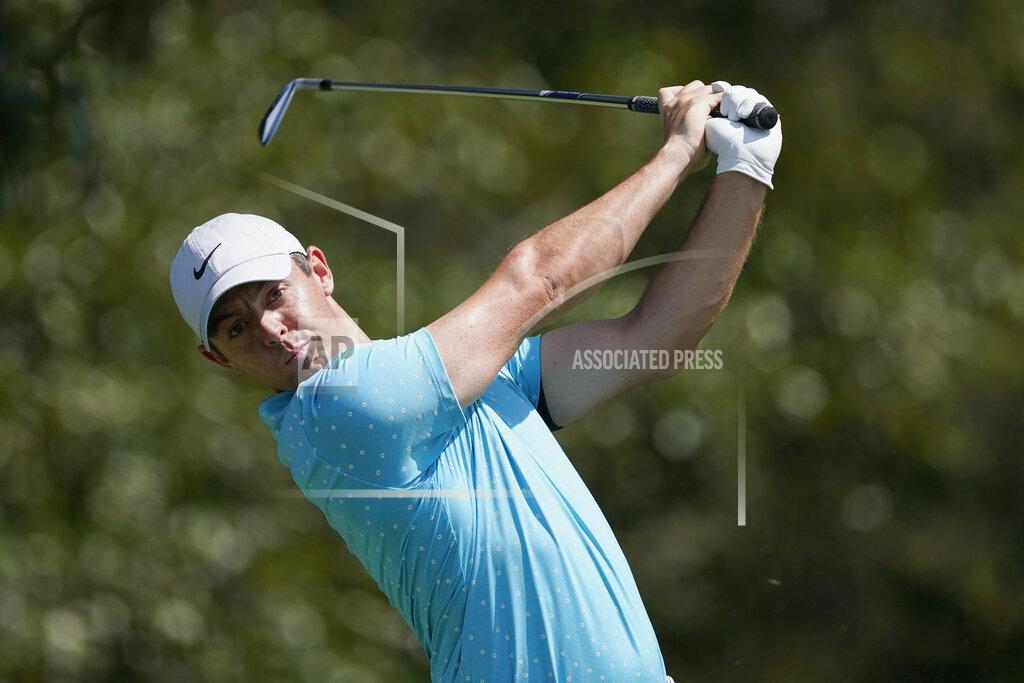 John Bazemore Rory McIlroy hits his tee shot from the third hole during the third round of the Tour Championship golf tournament at East Lake Golf Club in Atlanta, Sunday, Sept. 6, 2020. (AP Photo/John Bazemore)