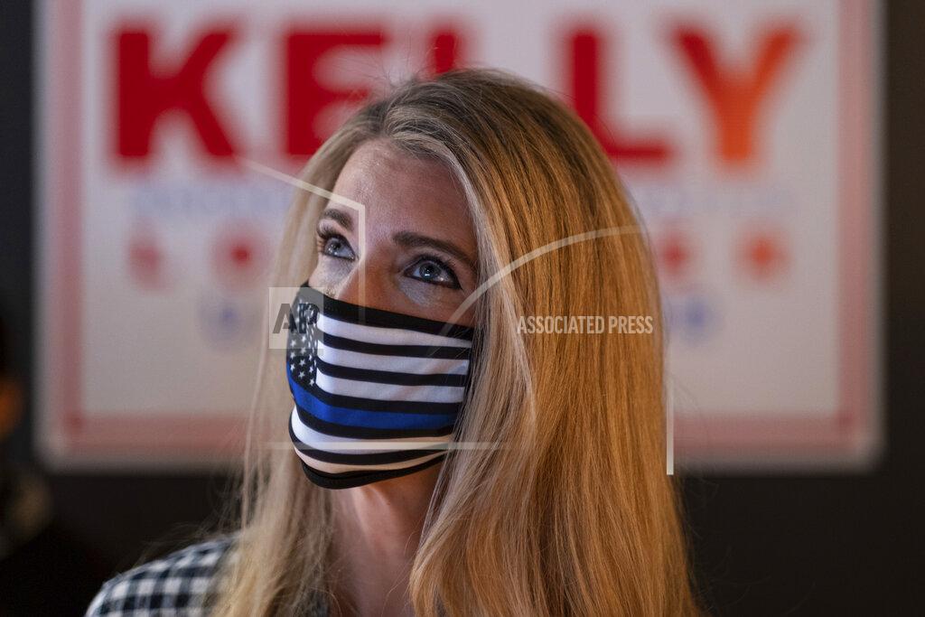 Ben Gray U.S. Sen. Kelly Loeffler, R-Ga., talks to supporters during a campaign event Friday, Dec. 31, 2020 at McCray's Tavern in Marietta, Ga. (AP Photo/Ben Gray)
