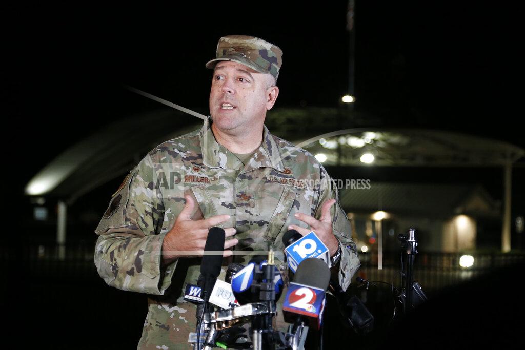 Jay Laprete Colonel Patrick MIller, 88th Air Base Wing and Installation Commander, answers questions during a news conference after a lockdown at Wright-Patterson Air Force Base Friday, Sept. 10, 2021, in Dayton, Ohio. The base was put on lockdown due to a report of an active shooter but was later given the all clear. (AP Photo/Jay LaPrete)