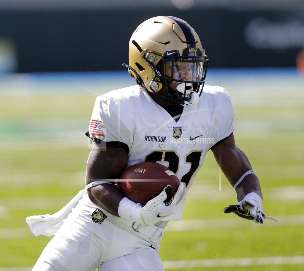 A. J. Sisco Army running back Tyrell Robinson (21) carries the ball into the end zone against Tulane during an NCAA college football game in New Orleans, La., Saturday, Nov. 14, 2020. (A. J. Sisco/The Advocate via AP)