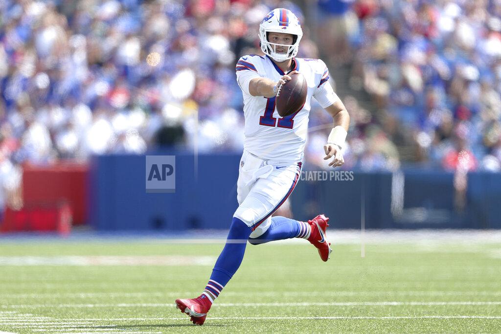 Joshua Bessex Buffalo Bills quarterback Josh Allen scrambles for a gain during the first half of a preseason NFL football game against the Green Bay Packers, Saturday, Aug. 28, 2021, in Orchard Park, N.Y. (AP Photo/Joshua Bessex)