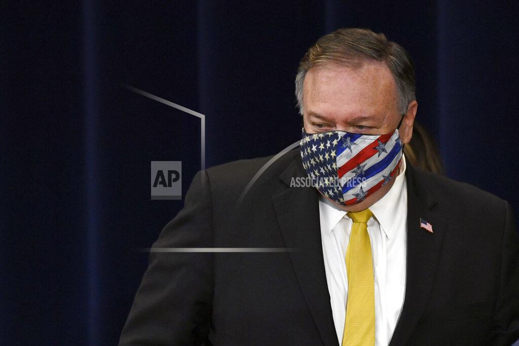 Secretary of State Mike Pompeo walks off of the stage following a news conference at the State Department in Washington, Wednesday, Aug. 19, 2020, with Iraqi Foreign Minister Fuad Hussein. (AP Photo/Susan Walsh)