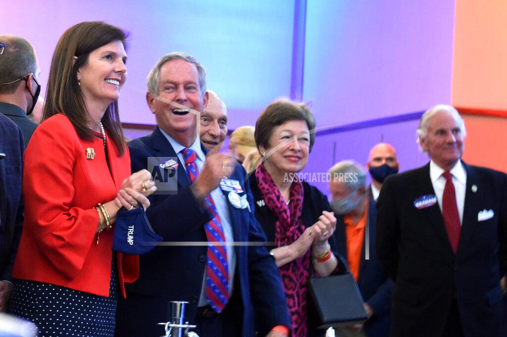 Meg Kinnard South Carolina Lt. Gov. Pam Evette, left, Rep. Joe Wilson, R-S.C., and South Carolina Gov. Henry McMaster, right, smile as Sen. Lindsey Graham, R-S.C., speaks after winning re-election, Tuesday, Nov. 3, 2020, in Columbia, S.C. (AP Photo/Meg Kinnard)
