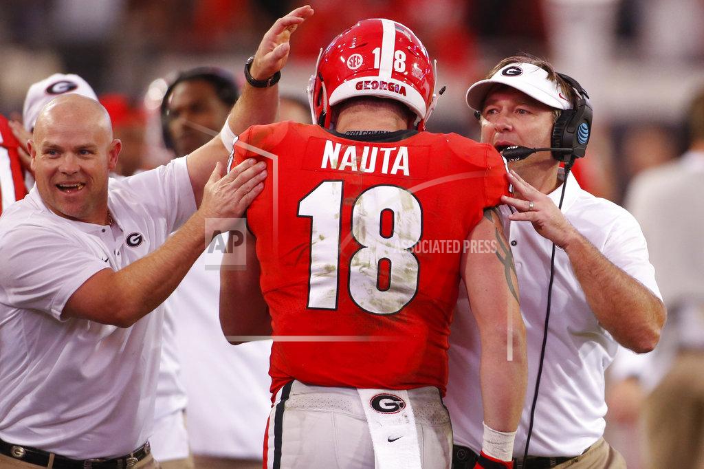 Joshua L. Jones Georgia tight end Isaac Nauta (18) celebrates with Georgia coach Kirby Smart during the second half of an NCAA college football game between Georgia and Florida at in Jacksonville, Fla. Saturday, Oct. 27, 2018. (Joshua L. Jones/Athens Banner-Herald via AP)