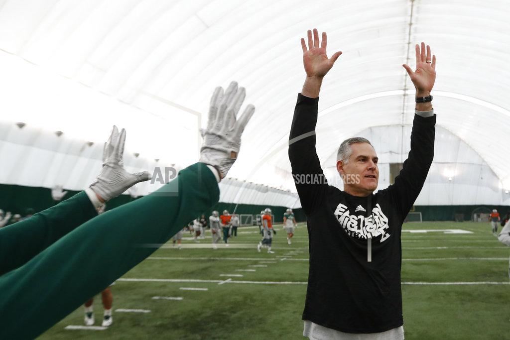 Paul Sancya Eastern Michigan football coach Chris Creighton reacts to a drill during practice in Ypsilanti, Mich., Monday, Dec. 10, 2018. Eastern Michigan's football team has stepped out of the shadows created by the neighboring University of Michigan and four professional teams just down the road in the Motor City. The Eagles will face Georgia Southern in the Camellia Bowl on Saturday, earning a spot in NCAA football postseason play for the second time in three years and just the third time in school history. (AP Photo/Paul Sancya)