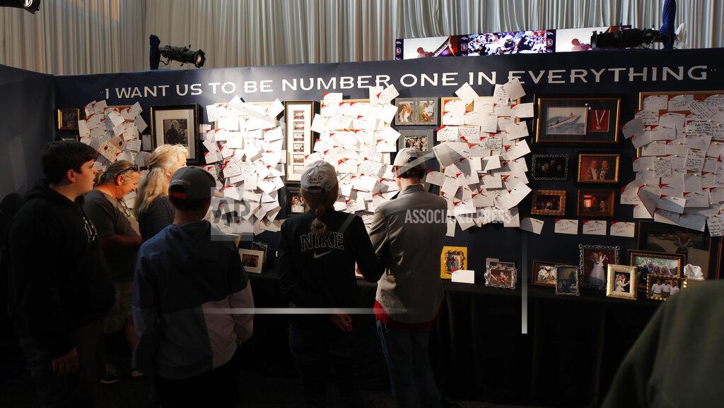 David Zalubowski Fans look at a wall of notes at a five-hour memorial for Denver Broncos owner Pat Bowlen Tuesday, June 18, 2019, at Mile High Stadium, the NFL football team's home in Denver. Bowlen, who has owned the franchise for more than three decades, died last Thursday. (AP Photo/David Zalubowski)