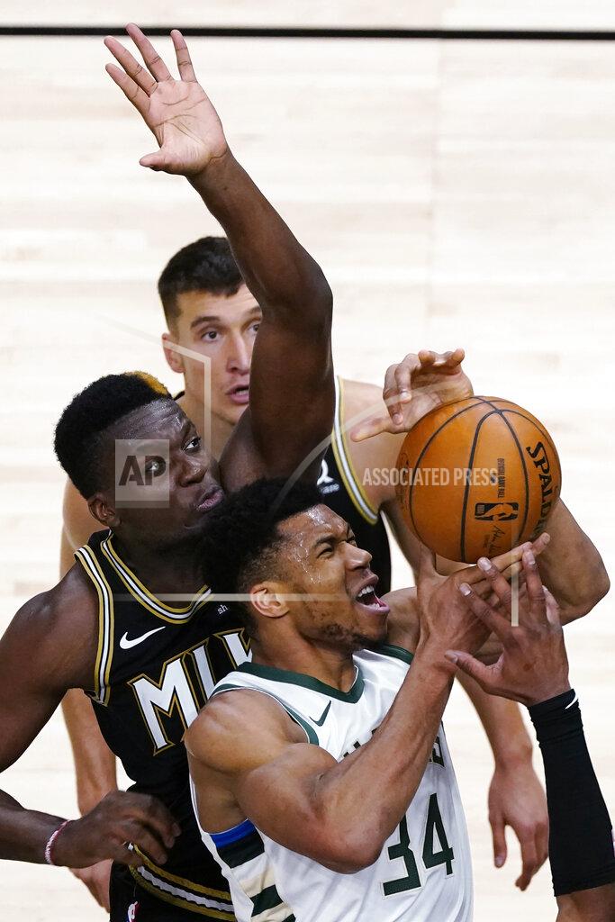 John Bazemore Milwaukee Bucks forward Giannis Antetokounmpo (34) drives to the basket as Atlanta Hawks center Clint Capela defends during the second half of an NBA basketball game Thursday, April 15, 2021, in Atlanta. (AP Photo/John Bazemore)