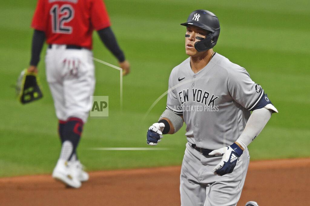 David Dermer New York Yankees' Aaron Judge (99) runs the bases after hitting a two run home run off Cleveland Indians starting pitcher Shane Bieber (57) in the first inning of Game 1 of an American League wild-card baseball series, Tuesday, Sept. 29, 2020, in Cleveland. (AP Photo/David Dermer)