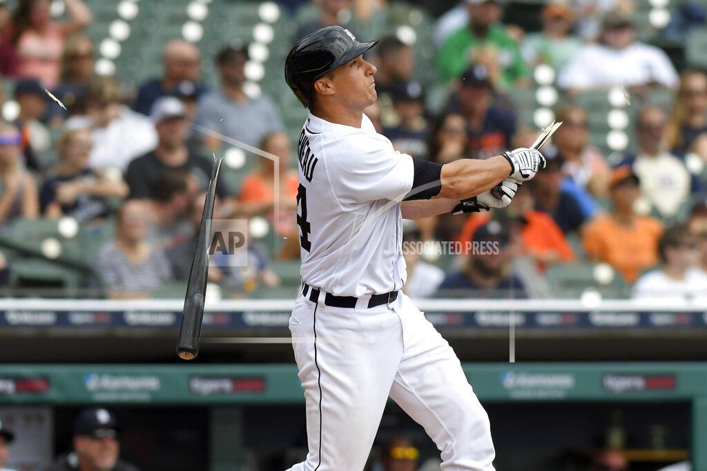 Jose Juarez Detroit Tigers catcher Dustin Garneau breaks his bat as he hits a double against the Tampa Bay Rays in the third inning of a baseball game, Sunday, Sept. 12, 2021, in Detroit. (AP Photo/Jose Juarez)
