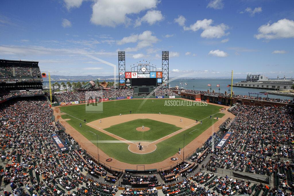 FILE - This June 15, 2016, file photo shows AT&T Park from an overhead view as the San Francisco Giants play the Milwaukee Brewers during a baseball game in San Francisco. The Oakland Raiders are in talks with the Giants about playing their home games next season at Oracle Park, formerly known as AT&T Park. A person with knowledge of the negotiations said Sunday night, Feb. 3, 2019, the two sides are in discussions, but no deal has been reached. The person spoke to The Associated Press on condition of anonymity because nothing has been finalized. (AP Photo/Marcio Jose Sanchez, File)