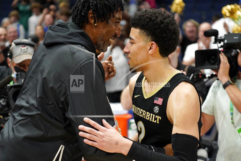 Chris O'meara Vanderbilt guard Scotty Pippen Jr., right, celebrates with his father, Hall of Fame basketball player Scottie Pippen, after Vanderbilt defeated Alabama during an NCAA men's college basketball Southeastern Conference tournament game Thursday, March 10, 2022, in Tampa, Fla. (AP Photo/Chris O'Meara)