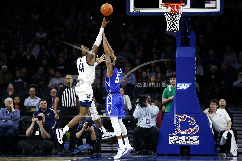 Matt Slocum Villanova's Saddiq Bey, left, goes up fro a shot against Creighton's Ty-Shon Alexander during the second half of an NCAA college basketball game, Saturday, Feb. 1, 2020, in Philadelphia. (AP Photo/Matt Slocum)