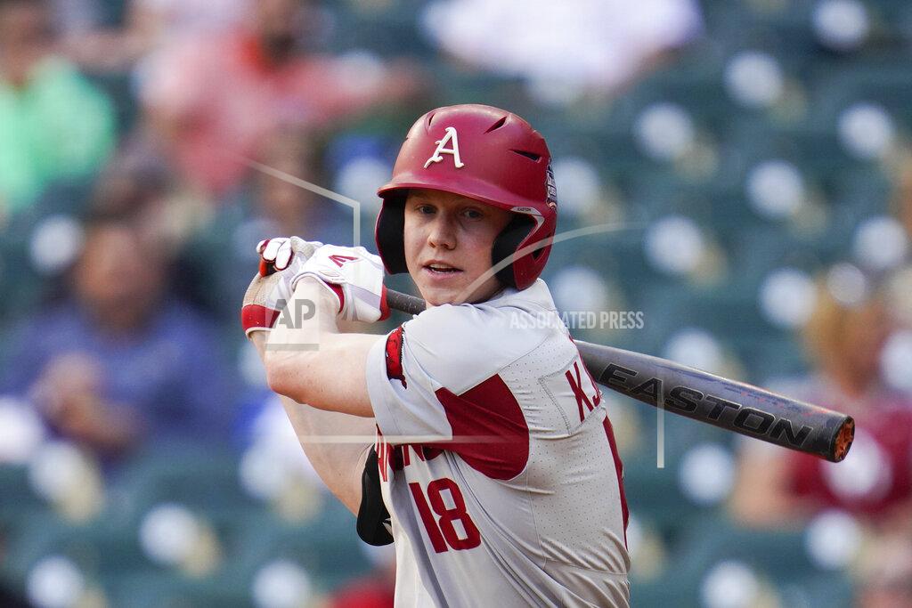 Matt Patterson FILE - In this Feb. 28, 2020, file photo, Arkansas outfielder Heston Kjerstad (18) swings at a pitch during an NCAA baseball game against Oklahoma, in Houston. Kjerstad is expected to be an early selection in the Major League Baseball draft. (AP Photo/Matt Patterson, File)
