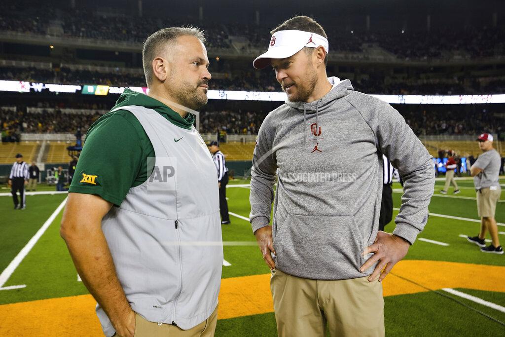 Ray Carlin Baylor head coach Matt Rhule, left, and Oklahoma head coach Lincoln Riley talk at midfield prior to an NCAA college football game in Waco, Texas, Saturday, Nov. 16, 2019. (AP Photo/Ray Carlin)