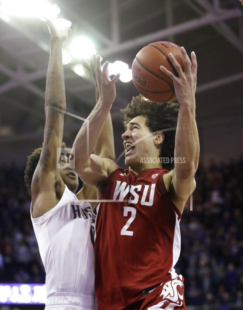 Elaine Thompson Washington State's CJ Elleby shoots during the second half of the team's NCAA college basketball game against Washington on Friday, Feb. 28, 2020, in Seattle. Washington State won 78-74. (AP Photo/Elaine Thompson)