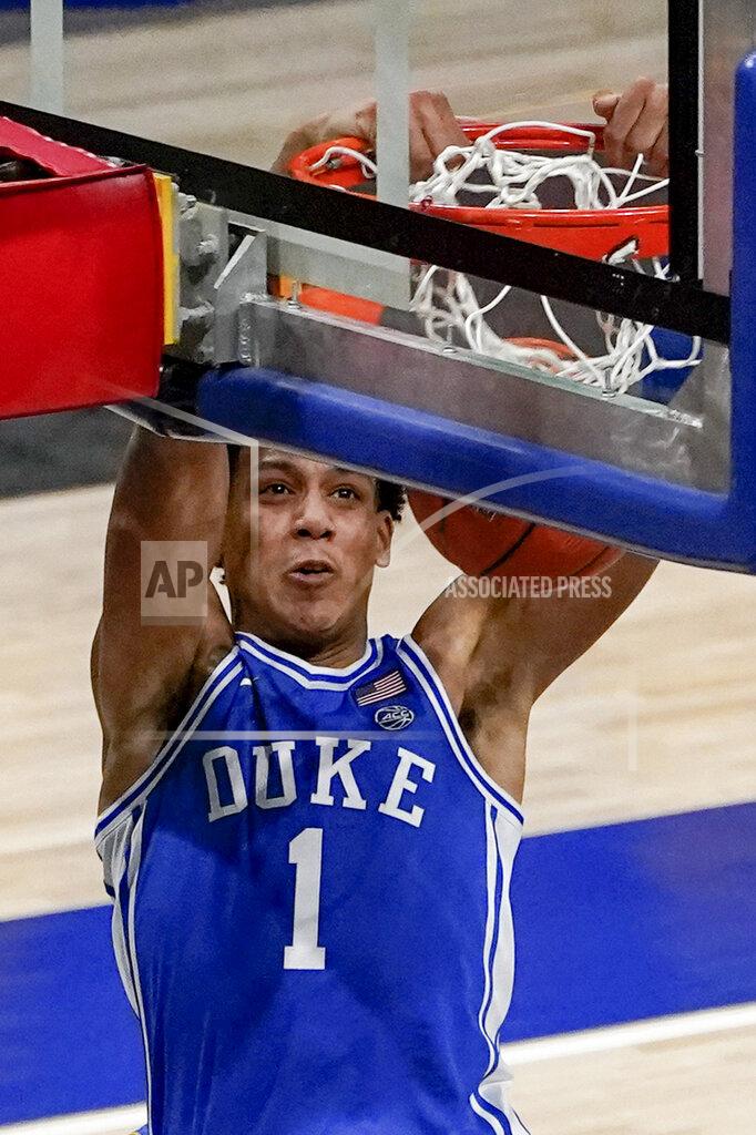 Keith Srakocic Duke's Jalen Johnson dunks against Pittsburgh during the second half of an NCAA college basketball game Tuesday, Jan. 19, 2021, in Pittsburgh. (AP Photo/Keith Srakocic)