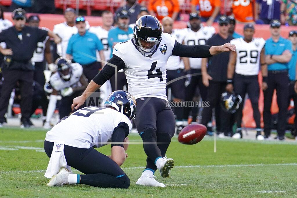 Jack Dempsey Jacksonville Jaguars kicker Josh Lambo (4) makes a game-winning field goal during the second half of an NFL football game against the Denver Broncos, Sunday, Sept. 29, 2019, in Denver. (AP Photo/Jack Dempsey)