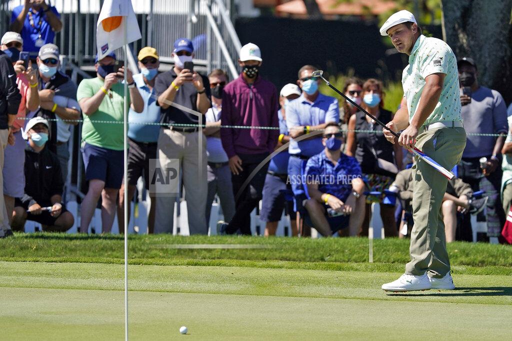 John Raoux Bryson DeChambeau reacts as his putt on the ninth green comes up short of the hole during the first round of the Arnold Palmer Invitational golf tournament Thursday, March 4, 2021, in Orlando, Fla. (AP Photo/John Raoux)