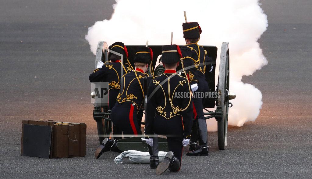 Alastair Grant Soldiers of the Royal Horse Artillery fire a ceremonial gun during the 41 Death Gun salute in memory of Prince Philip at the Royal Artillery barracks in Woolwich, London, Saturday, April 10, 2021. Buckingham Palace officials announced Friday that Prince Philip, the husband of Queen Elizabeth II, has died . He was 99. (AP Photo/Alastair Grant, Pool)