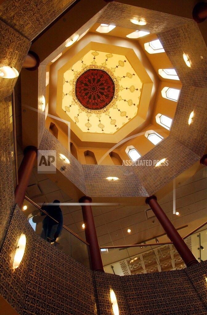 Carlos Osorio FILE- The interior of the Islamic-style dome that forms part of the Arab American National Museum appears in Dearborn, Mich. on April 15, 2005. The location is featured in a collection of mini-essays by American writers published online by the Frommer's guidebook company about places they believe helped shape and define America. (AP Photo/Carlos Osorio, File)