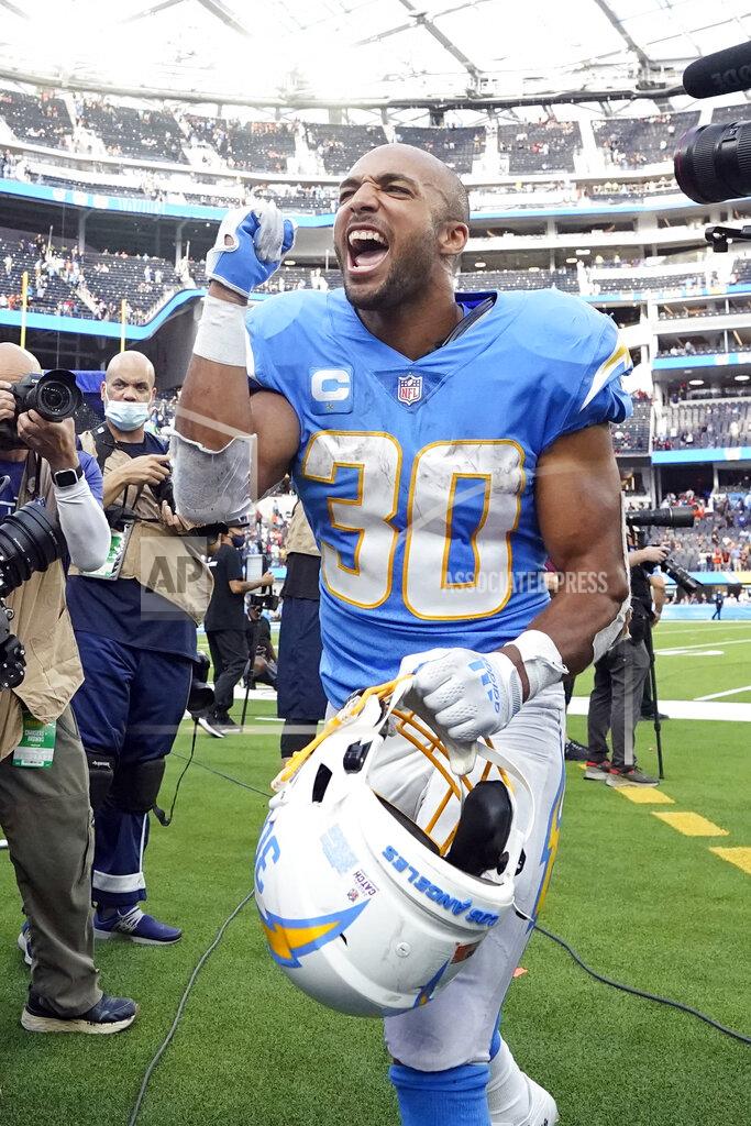 Gregory Bull Los Angeles Chargers running back Austin Ekeler walks off the field after a win over the Cleveland Browns during an NFL football game Sunday, Oct. 10, 2021, in Inglewood, Calif. (AP Photo/Gregory Bull)