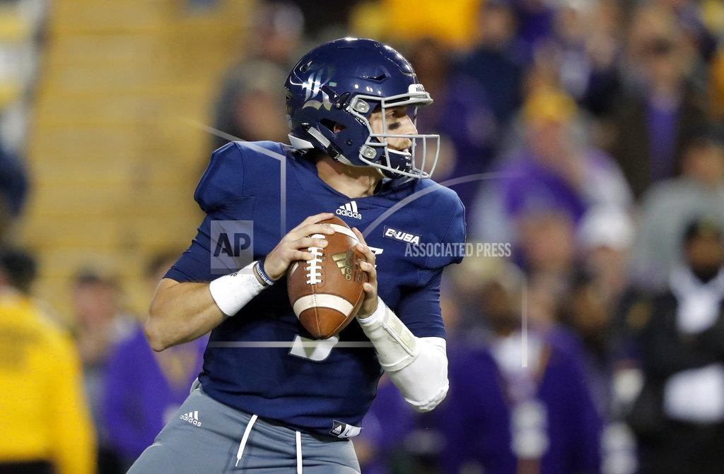 Gerald Herbert Rice quarterback Shawn Stankavage (3) drops back to pass in the first half of an NCAA college football game against LSU in Baton Rouge, La., Saturday, Nov. 17, 2018. (AP Photo/Gerald Herbert)