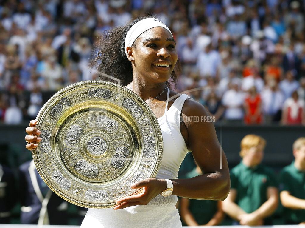 Kirsty Wigglesworth FILE - In this July 11, 2015, file photo, Serena Williams of the United States holds up the trophy after winning the women's singles final against Garbine Muguruza of Spain, at the All England Lawn Tennis Championships in Wimbledon, London. Williams won 6-4, 6-4. (AP Photo/Kirsty Wigglesworth, File)